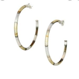 Sheila Fajil everyday hoops. Burnished silver